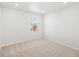 Bright bedroom featuring plush carpeting, neutral walls, and a window for natural light at 8850 Sedalia St, Commerce City, CO 80022