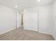 Bedroom featuring neutral walls, carpet, and a closet with sliding doors at 8850 Sedalia St, Commerce City, CO 80022