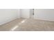 An airy bedroom featuring neutral carpet at 8850 Sedalia St, Commerce City, CO 80022