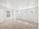 Spacious bedroom featuring neutral carpet, and windows for natural light at 8850 Sedalia St, Commerce City, CO 80022