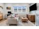 Cozy living room with a modern sofa, rustic wood coffee table, and stylish decor at 2466 S Delaware St # 3, Denver, CO 80223