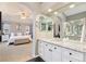 Ensuite bathroom with a soaking tub, tile floors, and granite counters at 4501 Whitehall Ln, Highlands Ranch, CO 80126