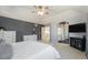 This is a large main bedroom with an ensuite bathroom and stairway in view at 4501 Whitehall Ln, Highlands Ranch, CO 80126