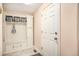 Mud room with built-in storage and a bench at 4501 Whitehall Ln, Highlands Ranch, CO 80126