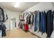 Spacious walk-in closet with ample storage space at 4501 Whitehall Ln, Highlands Ranch, CO 80126