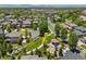 Panoramic aerial view of the community showcasing a playground, park, and surrounding homes at 13645 Osage Ct, Broomfield, CO 80023