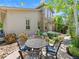 Inviting patio with a dining set and meticulously landscaped yard, perfect for outdoor gatherings at 13645 Osage Ct, Broomfield, CO 80023
