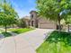 Charming two-story home with stone accents, manicured lawn, and a spacious driveway at 13645 Osage Ct, Broomfield, CO 80023