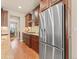 Chef's kitchen featuring stainless steel appliances and granite countertops with ample storage at 13645 Osage Ct, Broomfield, CO 80023