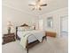 Comfortable main bedroom features a ceiling fan, neutral tones, and natural light at 13645 Osage Ct, Broomfield, CO 80023