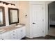 Bathroom with dual sinks, vanity and plenty of storage space at 2865 S Yampa Way, Aurora, CO 80013