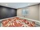Cozy bedroom with a bright window, and a decorative area rug at 2865 S Yampa Way, Aurora, CO 80013