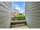 A charming balcony with iron railings provides a view of the exterior and neighborhood at 457 Black Feather Loop # 703, Castle Rock, CO 80104