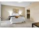 Cozy bedroom featuring a comfortable bed, neutral tones, and convenient closet access at 457 Black Feather Loop # 703, Castle Rock, CO 80104