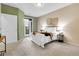 A comfortable bedroom with a private balcony, offering a blend of indoor and outdoor living at 457 Black Feather Loop # 703, Castle Rock, CO 80104
