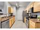 Well-appointed kitchen featuring stainless steel appliances and ample cabinet space at 457 Black Feather Loop # 703, Castle Rock, CO 80104