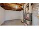 Unfinished basement showcasing mechanical systems and a spacious layout at 4154 Depew St, Denver, CO 80212