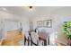 Lovely dining room area boasting hardwood floors and easy access to other rooms at 4154 Depew St, Denver, CO 80212