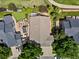Aerial view of property showcasing a putting green and outdoor living area at 885 Sage Sparrow Cir, Highlands Ranch, CO 80129
