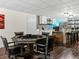 Basement entertaining space featuring a poker table and bar area with seating at 885 Sage Sparrow Cir, Highlands Ranch, CO 80129