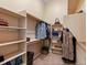 Spacious walk-in closet with ample storage and organization, perfect for wardrobe at 885 Sage Sparrow Cir, Highlands Ranch, CO 80129