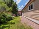 Spacious yard featuring vibrant greenery and low-maintenance gravel at 885 Sage Sparrow Cir, Highlands Ranch, CO 80129