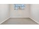 Simple bedroom with grey walls and carpeted floor at 1151 S Nome St, Aurora, CO 80012