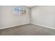 Simple bedroom with grey walls and carpeted floor at 1151 S Nome St, Aurora, CO 80012