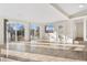 Spacious Gathering room featuring tile floors and sliding glass doors at 1151 S Nome St, Aurora, CO 80012