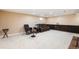 Cozy basement area with comfortable seating, ideal for relaxing at 7755 E Quincy Ave # T80, Denver, CO 80237