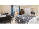 Bedroom with a closet and a desk at 7755 E Quincy Ave # T80, Denver, CO 80237