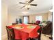 Well-lit dining room with comfortable seating for four and easy access to the living room at 7755 E Quincy Ave # T80, Denver, CO 80237