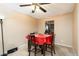 Inviting dining area with wood floors and adjacent to a well-equipped kitchen at 7755 E Quincy Ave # T80, Denver, CO 80237