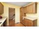 Spacious kitchen with lots of cabinet space and access to stairs, perfect for entertaining at 7755 E Quincy Ave # T80, Denver, CO 80237
