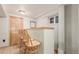 Finished basement featuring a bar area with wooden stools and a small window at 7367 Coors St, Arvada, CO 80005