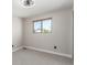 Bedroom has a window with lots of natural light, neutral colors, and carpeted flooring at 7367 Coors St, Arvada, CO 80005