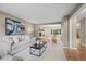 Cozy living room showcasing an open layout with sight lines to other rooms at 7409 Mount Meeker Rd, Longmont, CO 80503