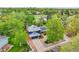 Aerial shot showcasing the property, its mature landscaping, and the surrounding neighborhood at 12355 E Arkansas Pl, Aurora, CO 80012