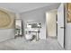 Bright bedroom features a modern vanity, decorative mirror, and a cozy aesthetic at 12355 E Arkansas Pl, Aurora, CO 80012