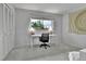 Bedroom featuring a desk, carpeted floors, closet space, and natural light at 12355 E Arkansas Pl, Aurora, CO 80012