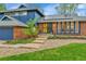 Stunning home with an inviting walkway leading to the front entrance at 12355 E Arkansas Pl, Aurora, CO 80012