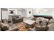 Community lounge area with couches, tables, and a pool table at 1365 Columbine St # 301, Denver, CO 80206