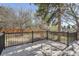Backyard oasis offers a spacious deck with fencing for outdoor living at 7998 S Wabash Ct, Centennial, CO 80112