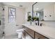 Updated bathroom with modern fixtures, natural light, and stylish vanity at 7998 S Wabash Ct, Centennial, CO 80112