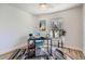 Bedroom features hardwood floors, natural light, and modern decor at 7998 S Wabash Ct, Centennial, CO 80112