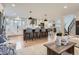 Modern kitchen featuring a large island with bar seating, stainless steel appliances at 7998 S Wabash Ct, Centennial, CO 80112