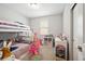 bedroom with bunk beds, closet and plenty of toys at 8346 Mount Kataka St, Littleton, CO 80125