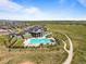 Stunning community pool and clubhouse amidst lush landscaping, offering a luxurious retreat for residents at 8346 Mount Kataka St, Littleton, CO 80125