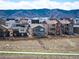 Well-maintained homes feature backyard patios with mountain views in a vibrant neighborhood at 8346 Mount Kataka St, Littleton, CO 80125