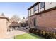 Brick patio with artificial turf and seating area at 1275 S Elizabeth St, Denver, CO 80210